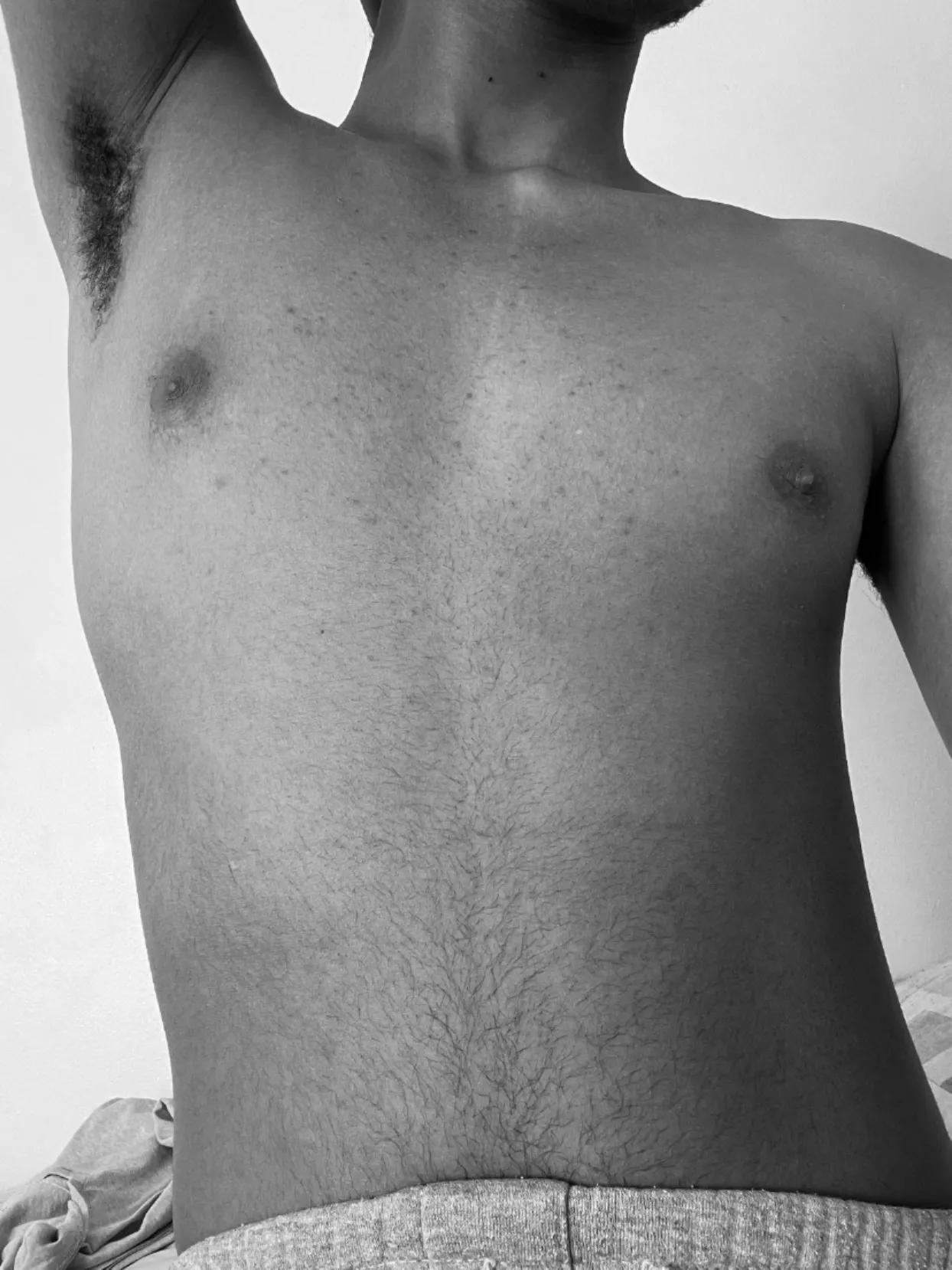 Idk what I like more between the pit hair or the subtle happy trail lol