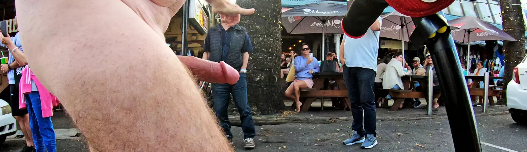 A very public erection that cannot be missed by ANYONE watching from the sidewalk, as he goes by with the WNBR.