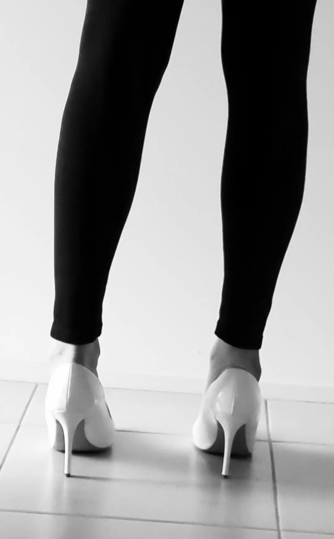 Black Leggings and White Heels