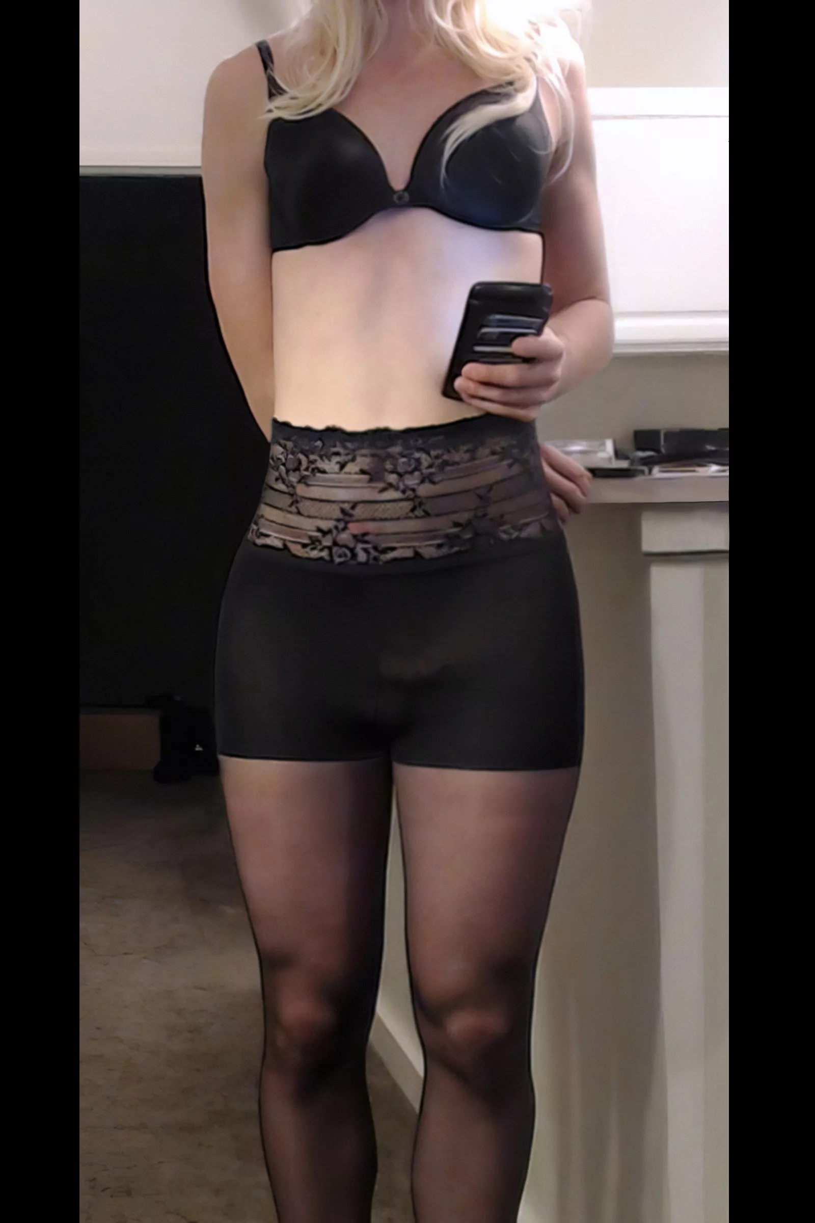 Teeny bulge in pantyhose