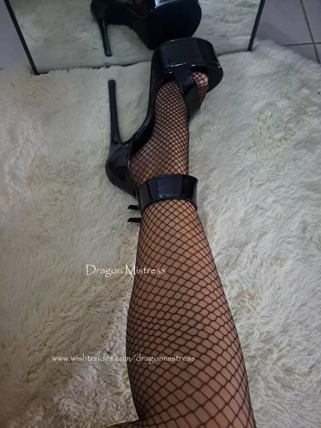 Fishnet and high heels can it get any better?