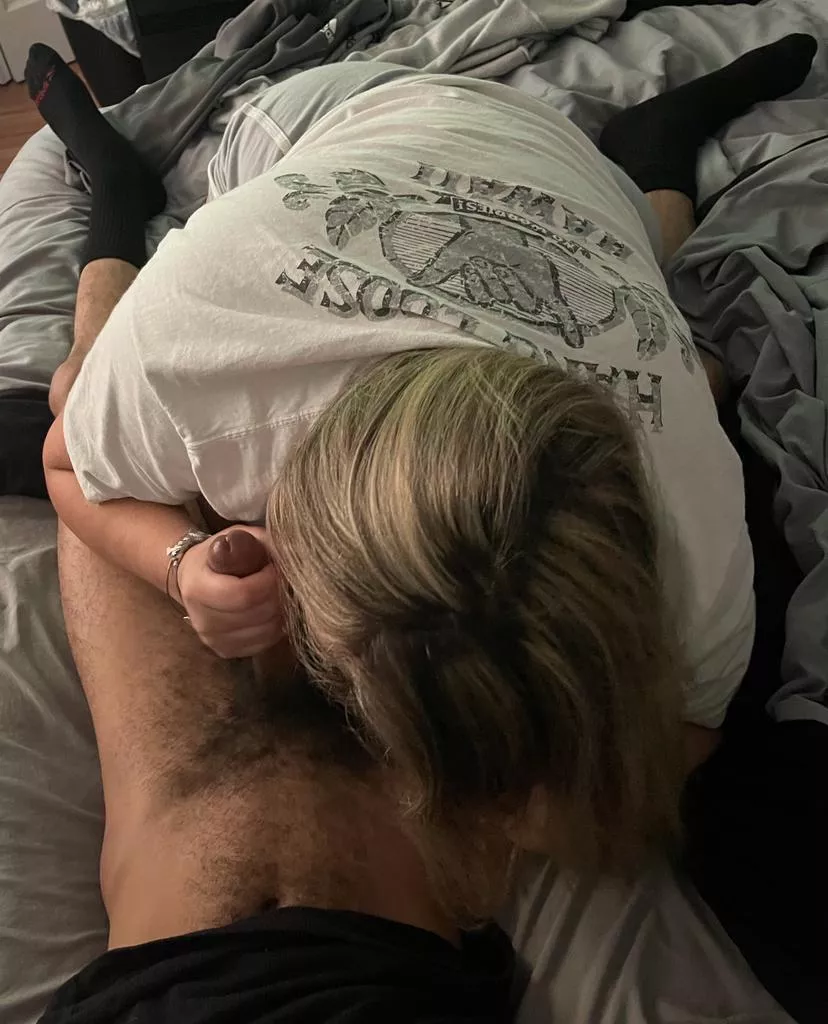 I love when she sucks my balls while stroking my dick