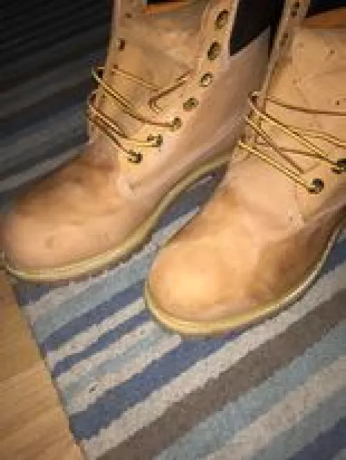 I need help, I tried to scrub the tiny black stain off my Timberlands with baking soda and a toothbrush, and now they have dark stains on them. What can I do to even out the colour?