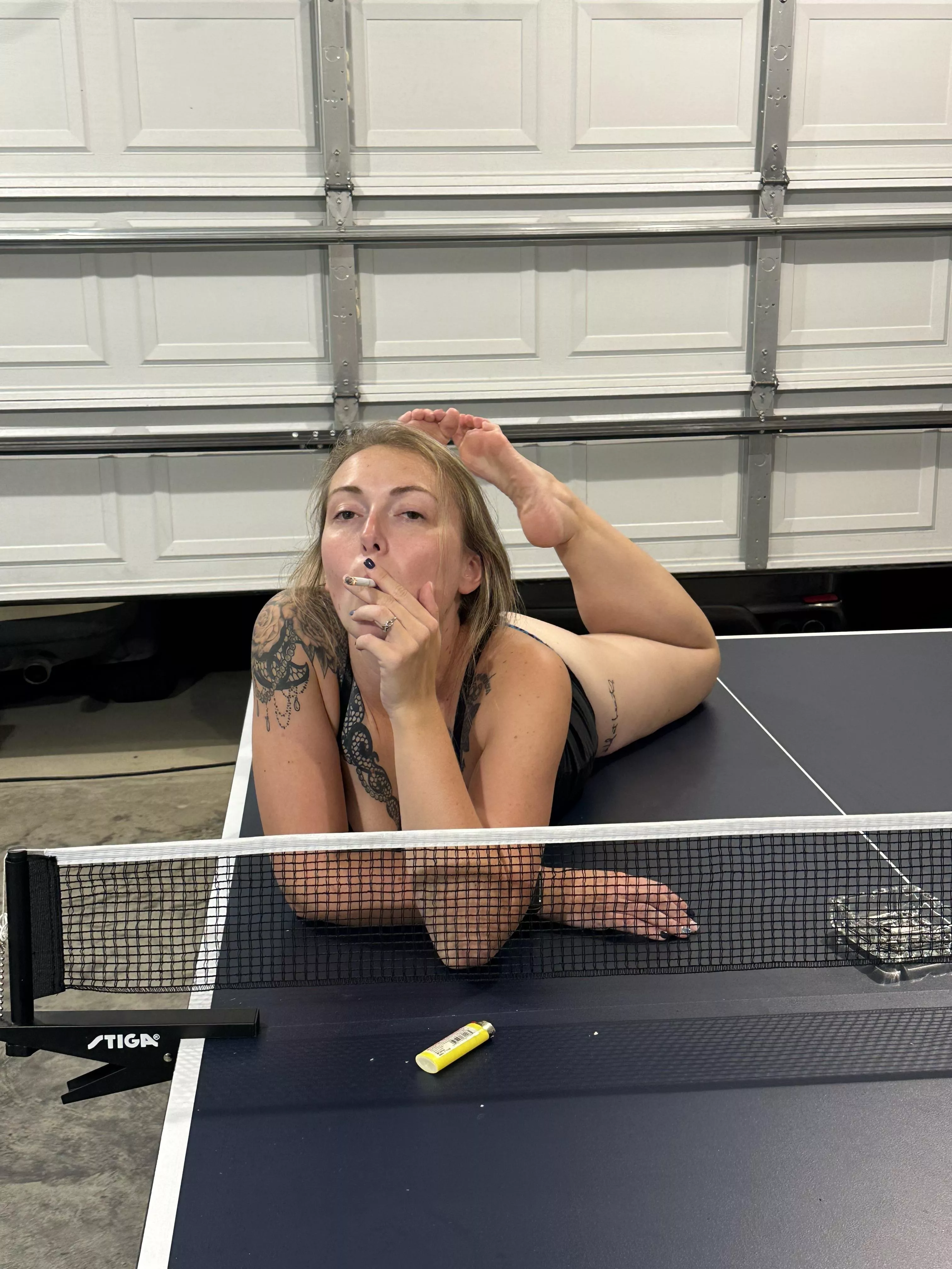 Non-smoker, smoking for my husband on the ping pong table in the garage