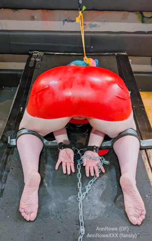 Woman in the red dress.