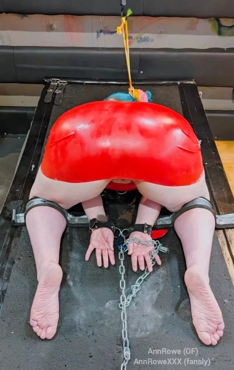 Woman in the red dress.