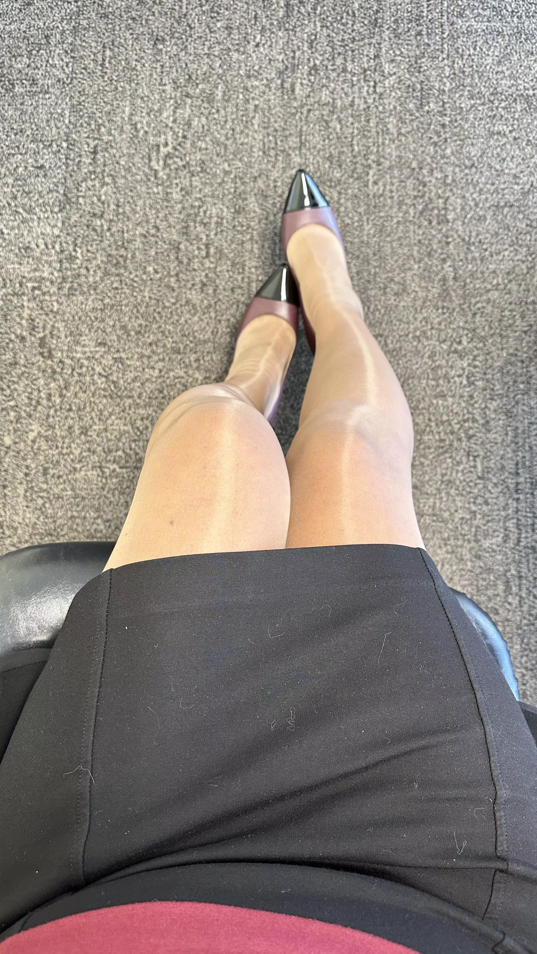 Shiny pantyhose at the office
