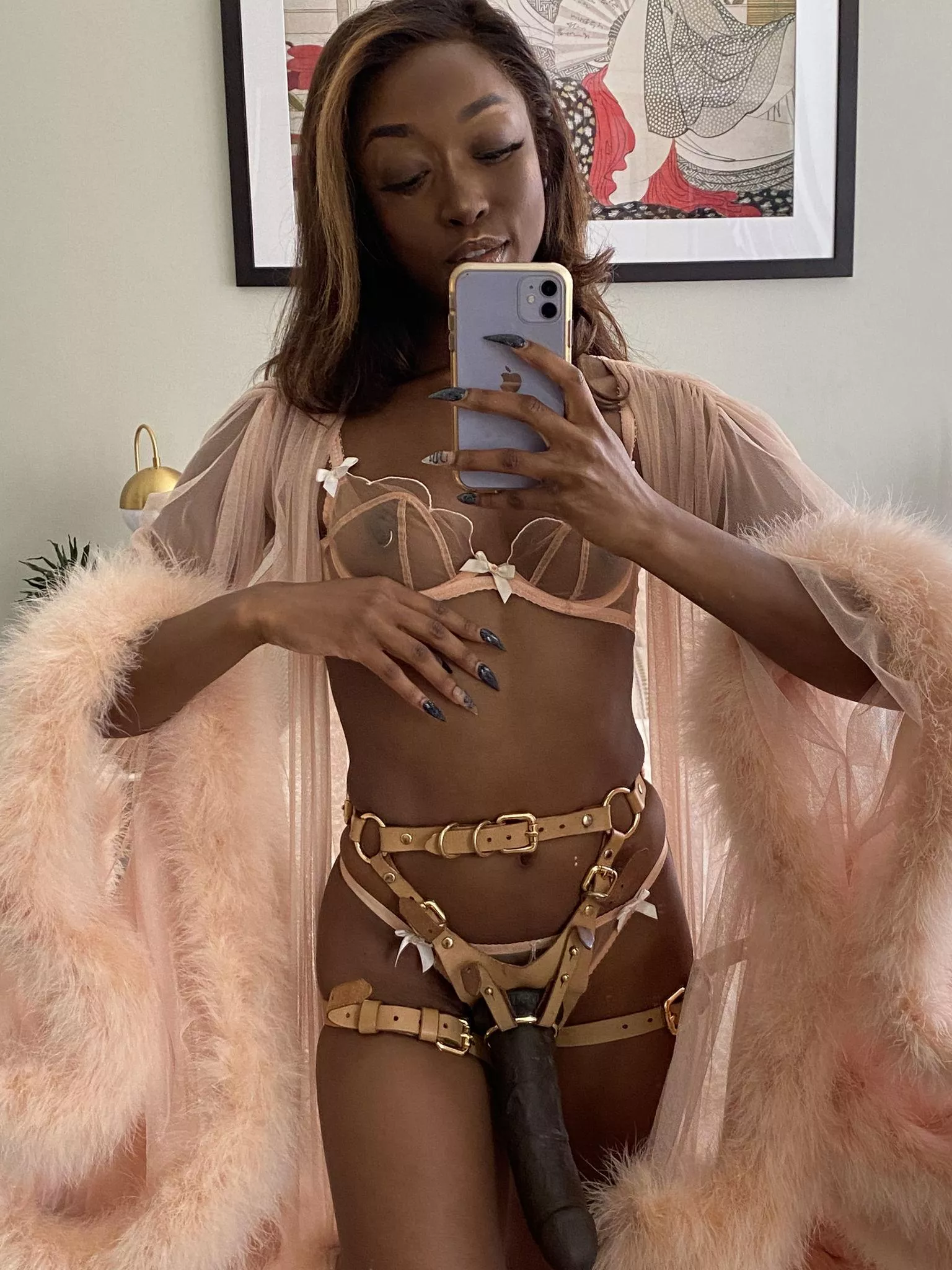 Strap-on or Nails? Which do you see first?