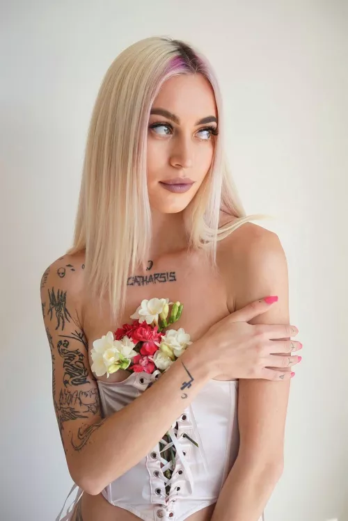 Tell me what tattoo to get on my left hand?