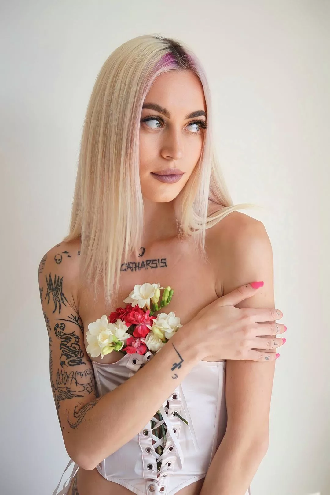 Tell me what tattoo to get on my left hand?