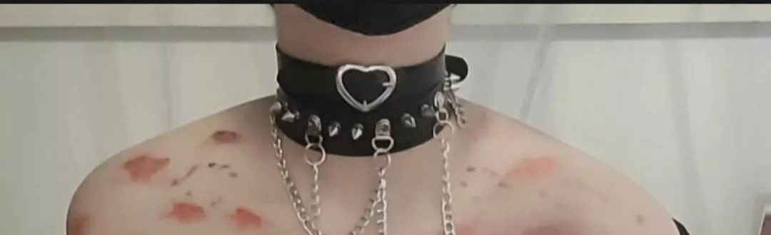 Wearing two collars instead of one.