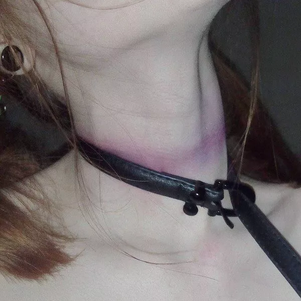 A permanent collar hide under the wearing one. Marking master's ownership on me forever