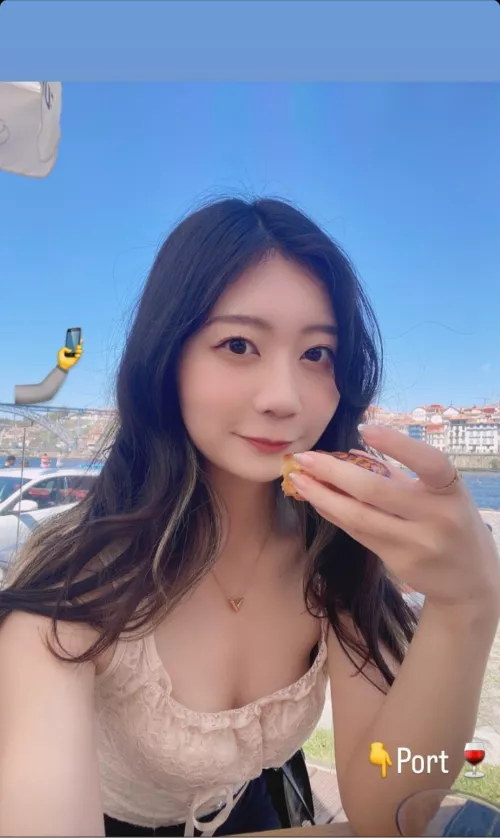 Cute Japanese girl eating dessert