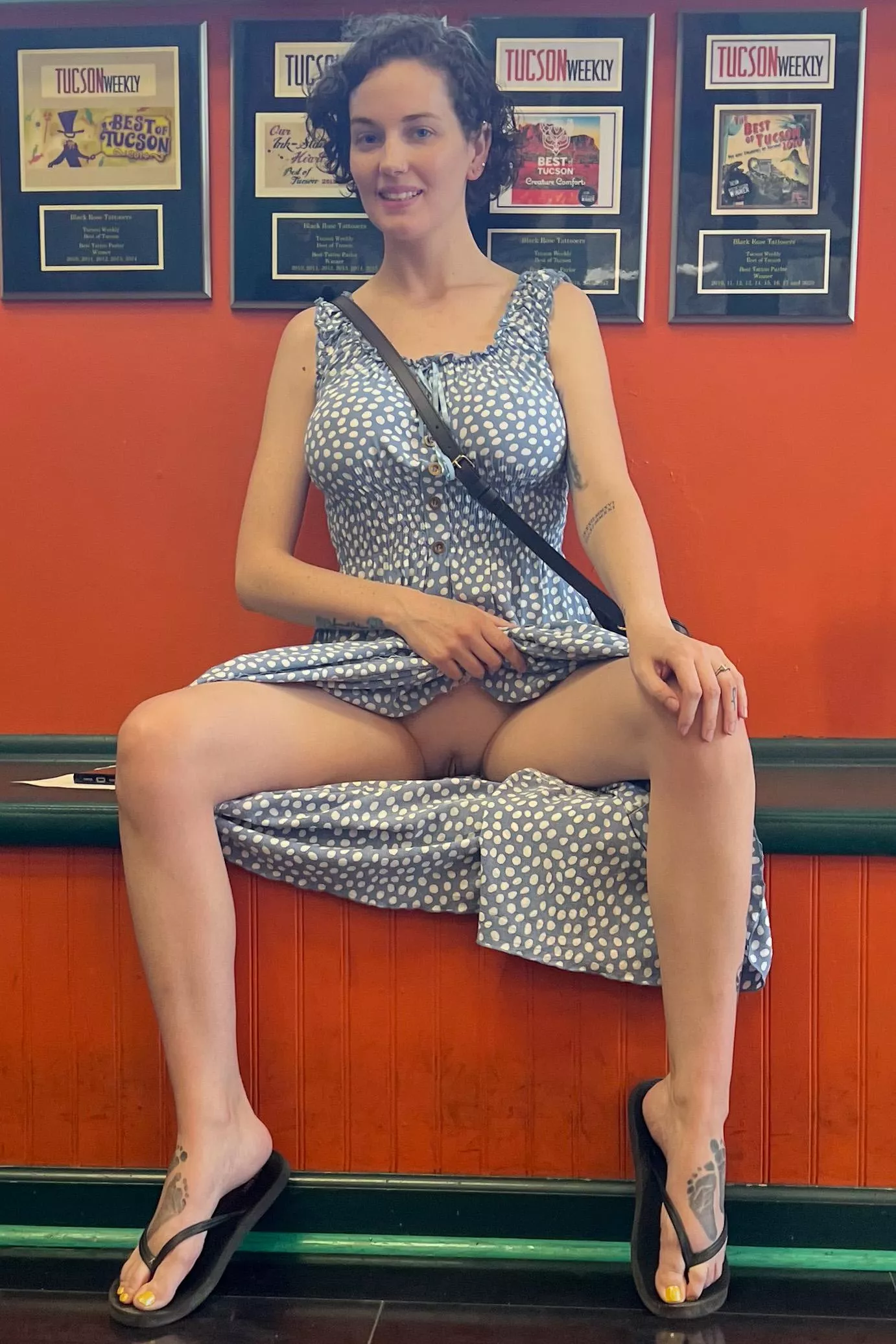 Taking a risk and giving a cheeky public upskirt tease, showing off my kitty charm