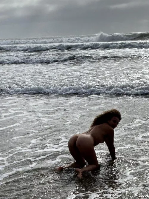 Early morning ocean skinny dip at a public beach