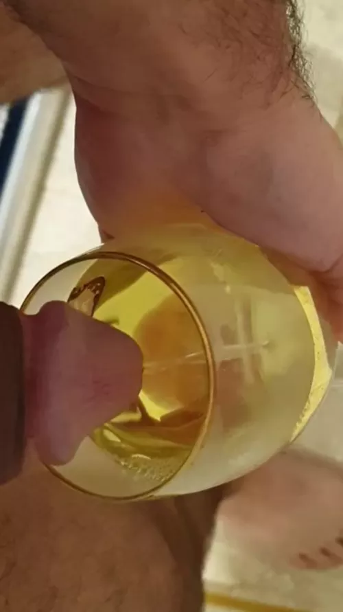 It's my own piss but I desperately wish it was yours. You wouldn't even need the cup.