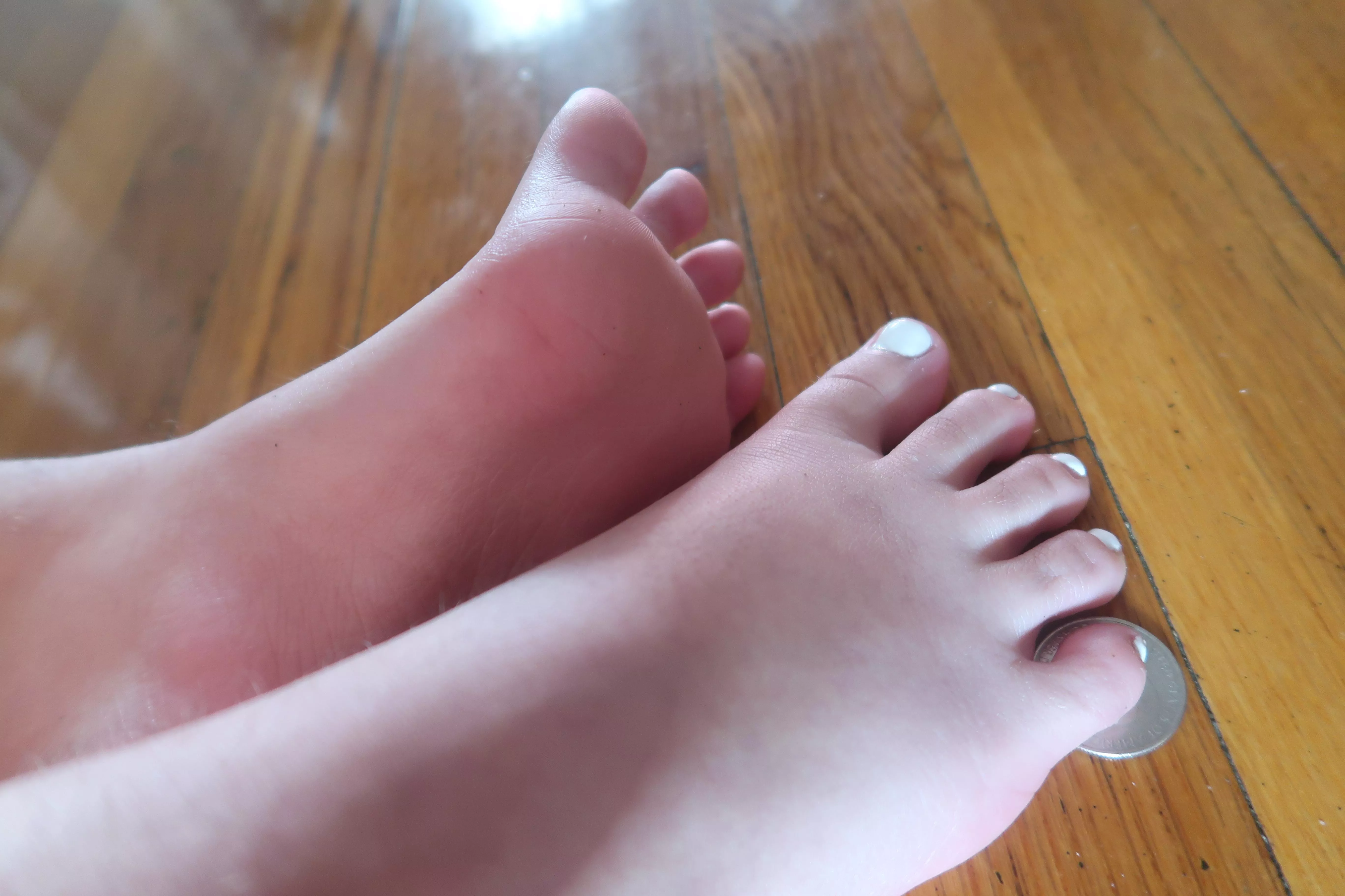 23 F, but with the smallest feet around :) Quarter for size comparison