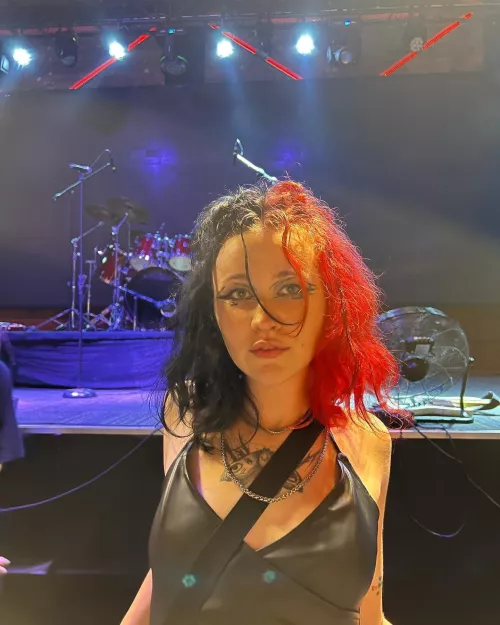 I'm in my tight leather top.