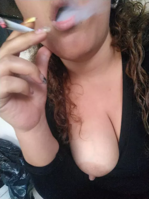 Smoking a cigarette 🔥🤭