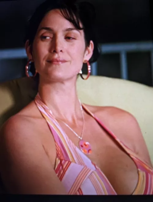Carrie Anne Moss's post baby cleavage