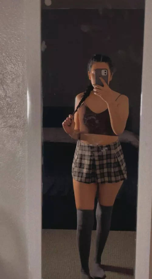 Wearing my favorite playful plaid skirt to school today.