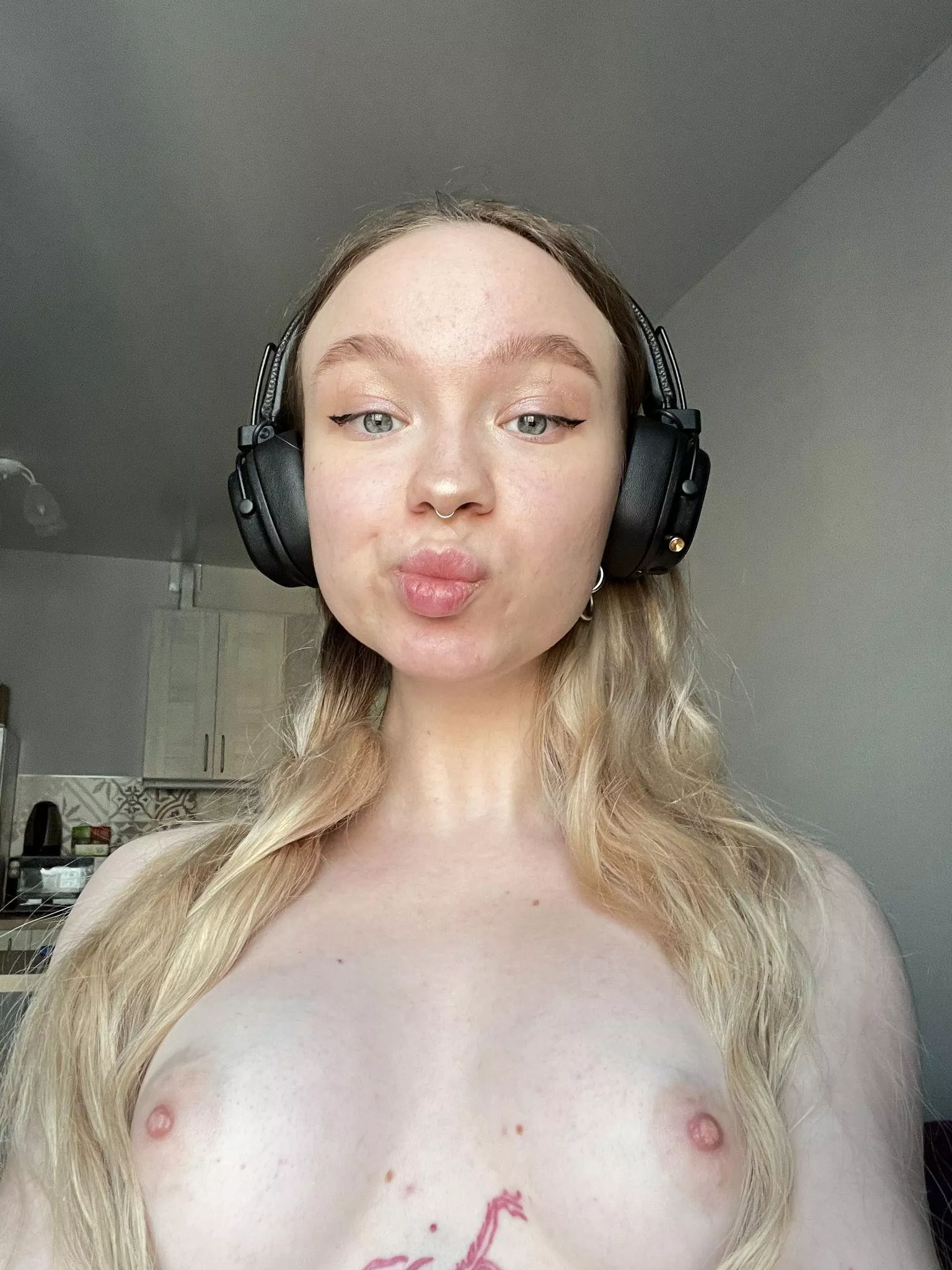 what do you think might be playing in my headphones?