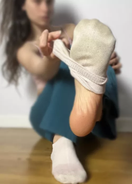 What makes you weaker? The sock or my bare sole? [f]