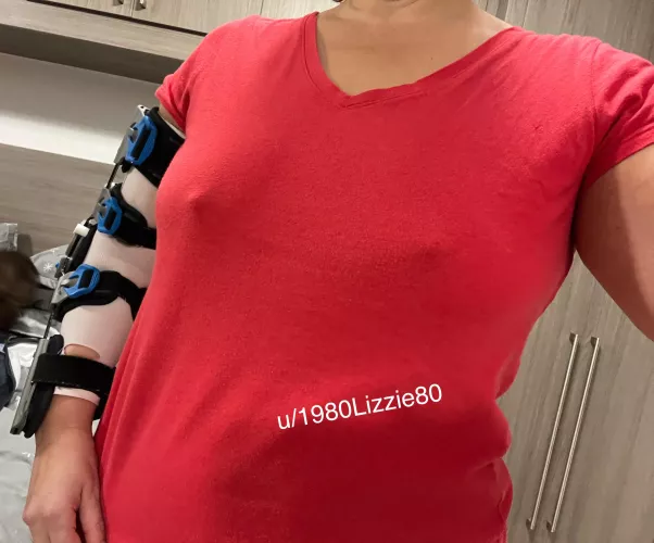 Do you think me going braless will distract people from my arm brace?