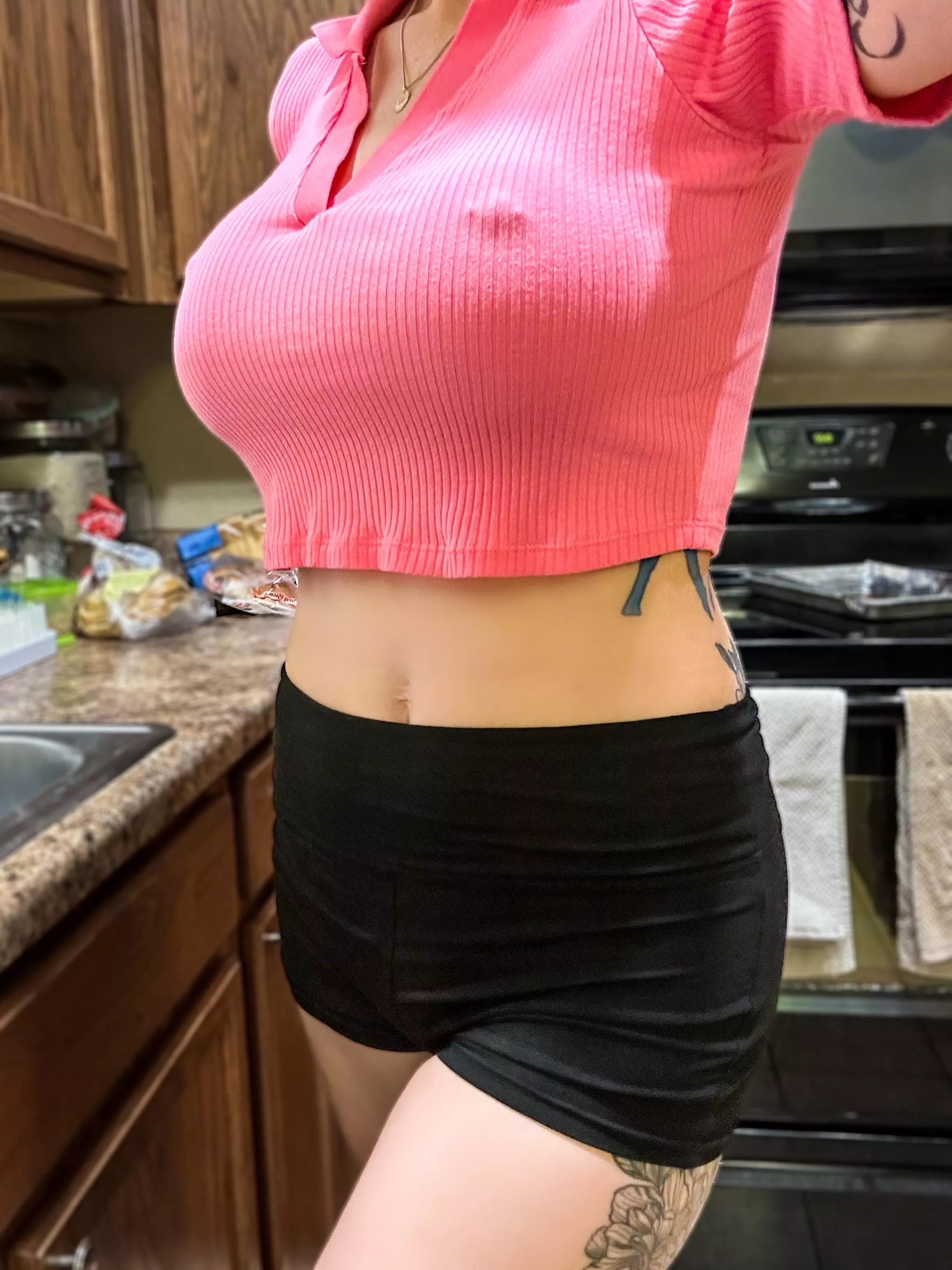 Hubby's away on business, so I'm lounging around the house in my usual crop top and booty shorts