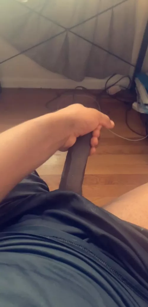 Stroking this heavy black dick 😏. Need it drained though