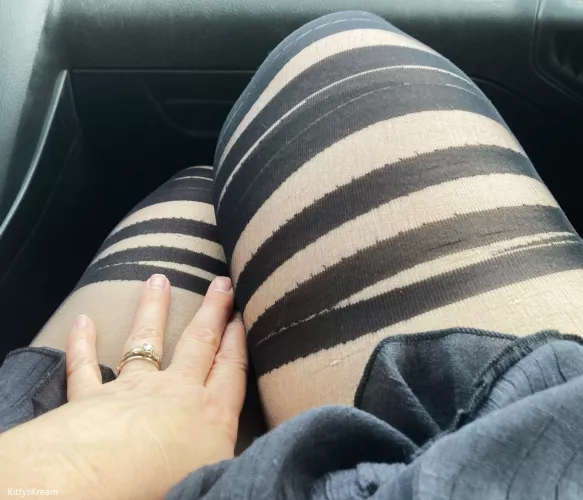 Trying to distract my husband while he drives