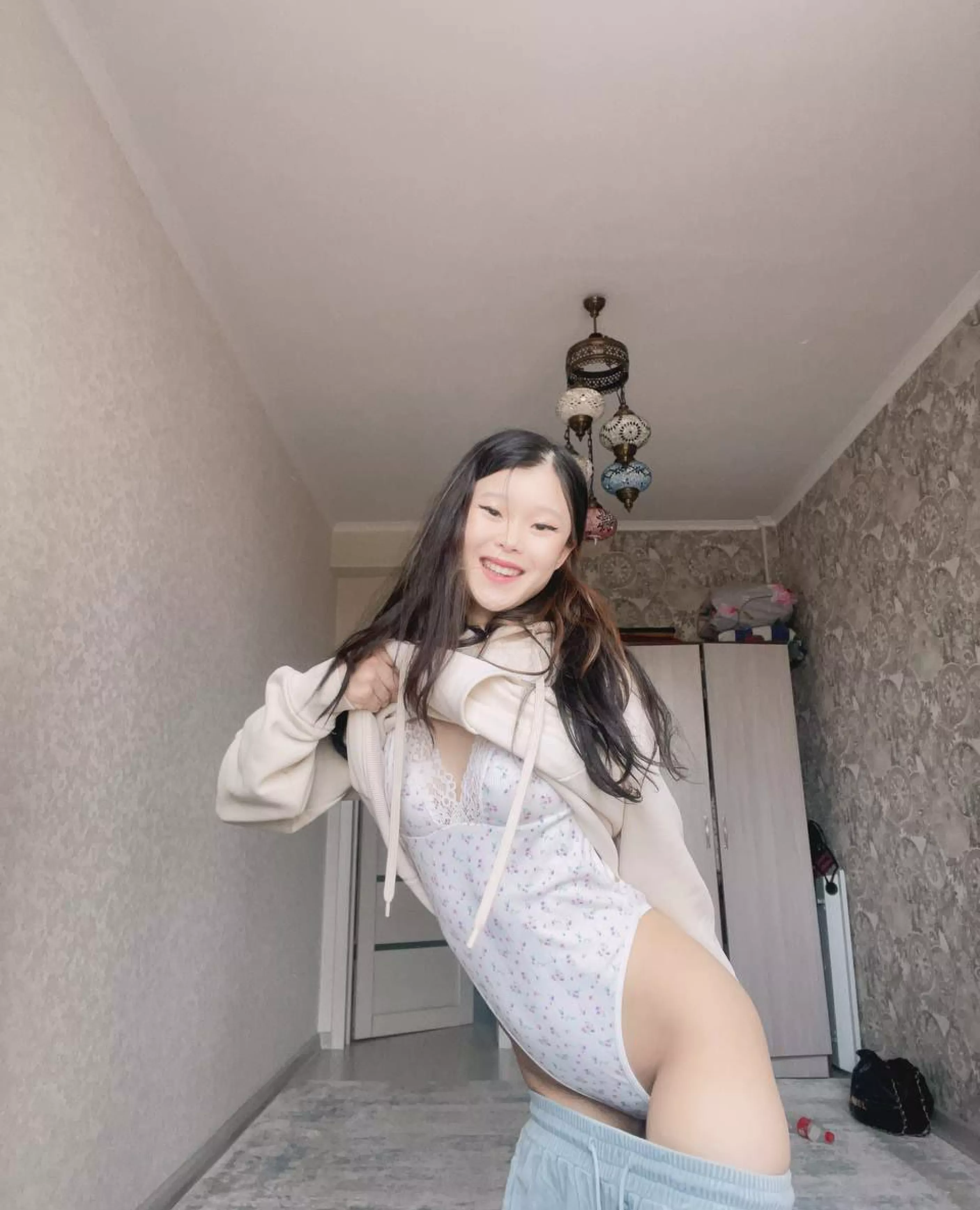 I think I look good in this white bodysuit.