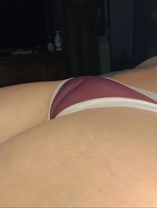 These little burgundy panties hug every curve