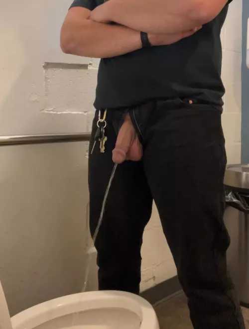 Unleashing my hose in a restaurant bathroom.