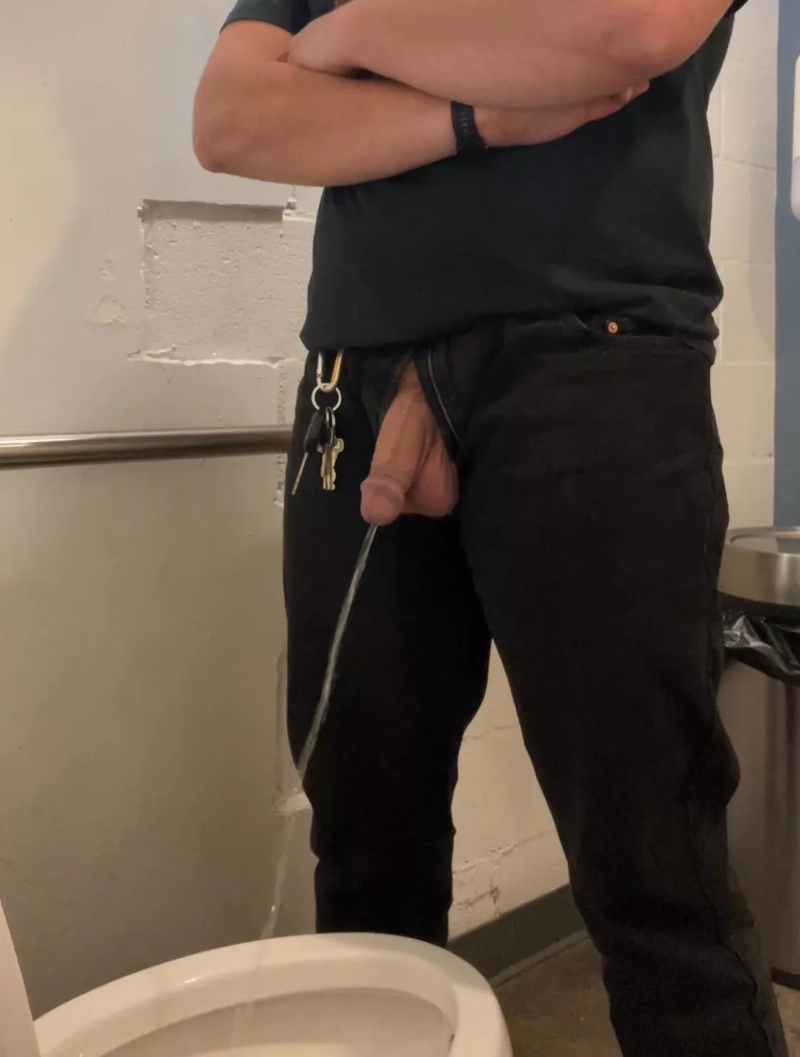 Unleashing my hose in a restaurant bathroom.