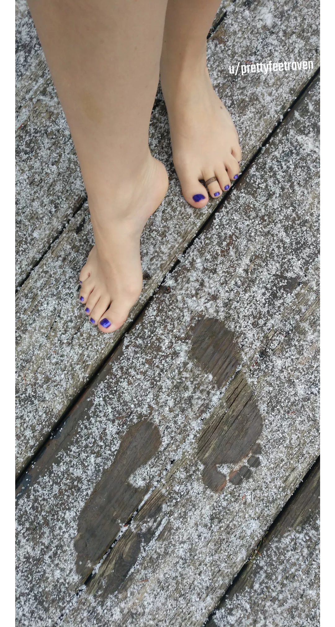 Playing in the snow, follow my foot prints