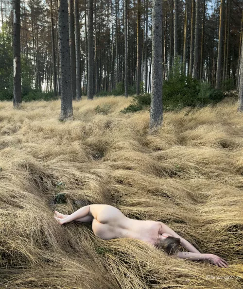 Self portrait of nudist blending into nature
