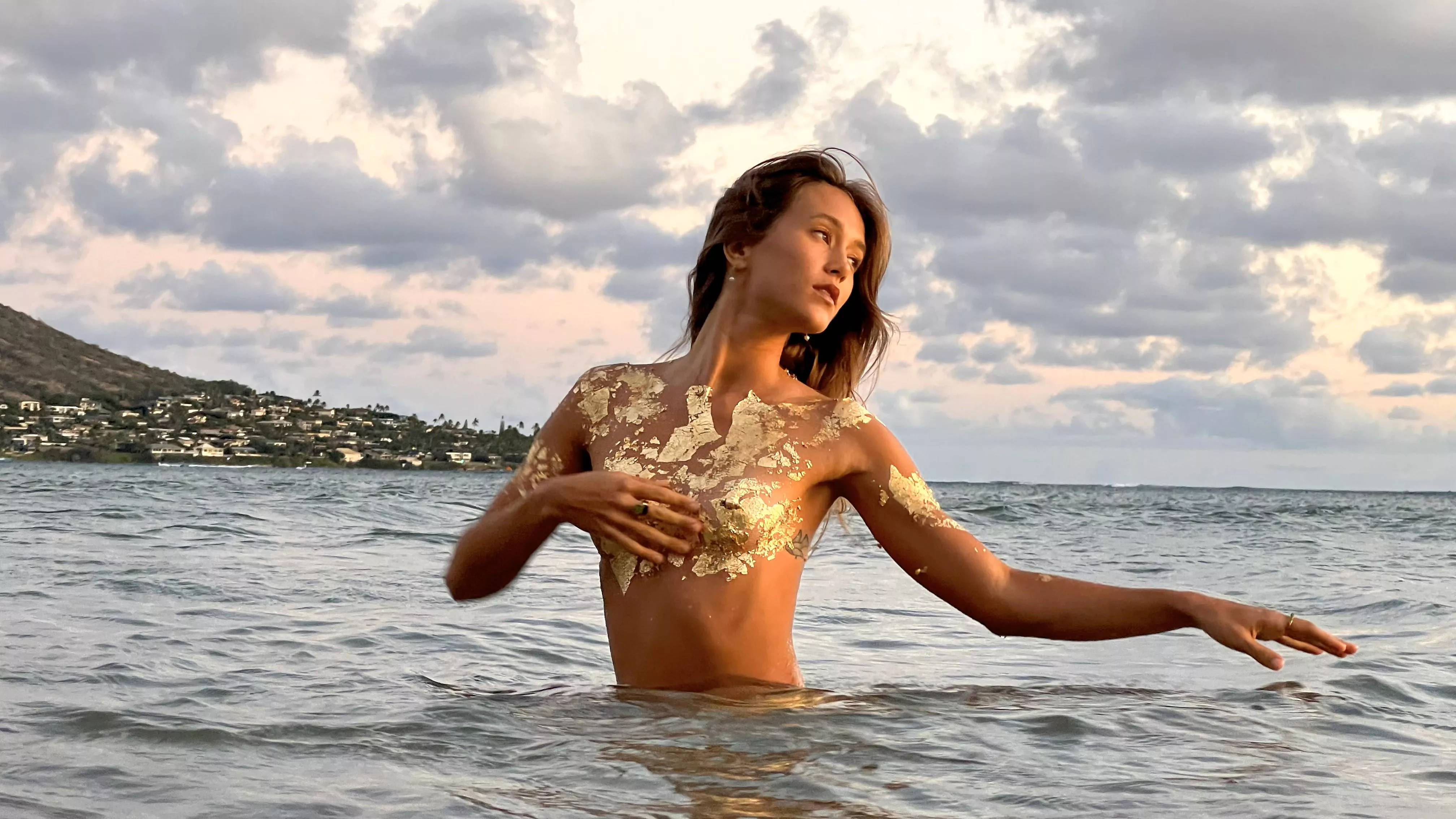 In the water at the beach is where I belong