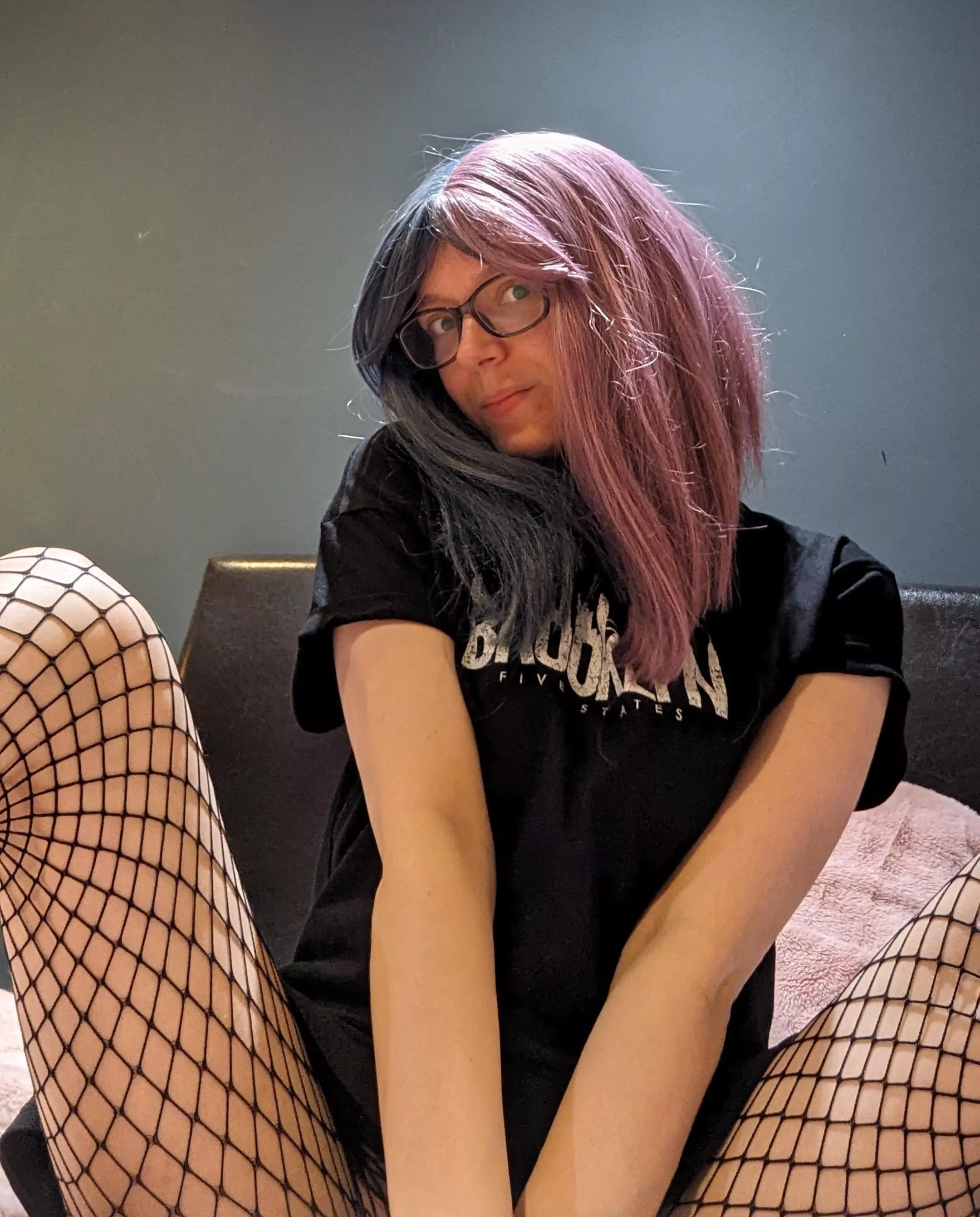 Black tee and fishnets combo