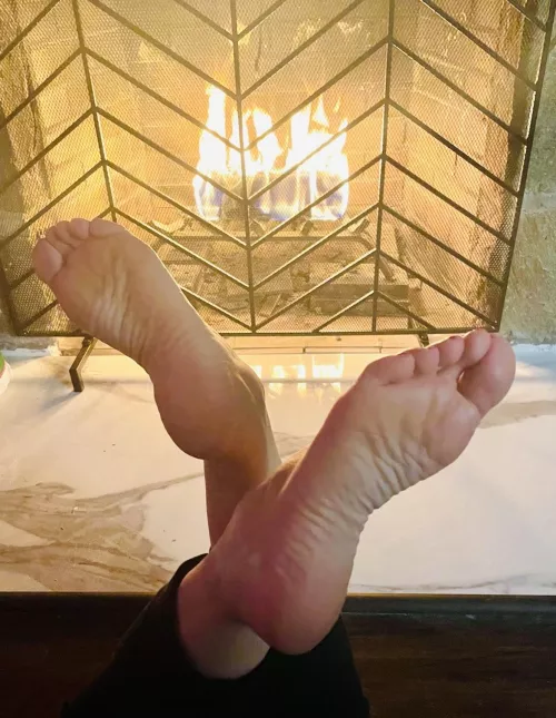 Keeping my feet warm by the fire