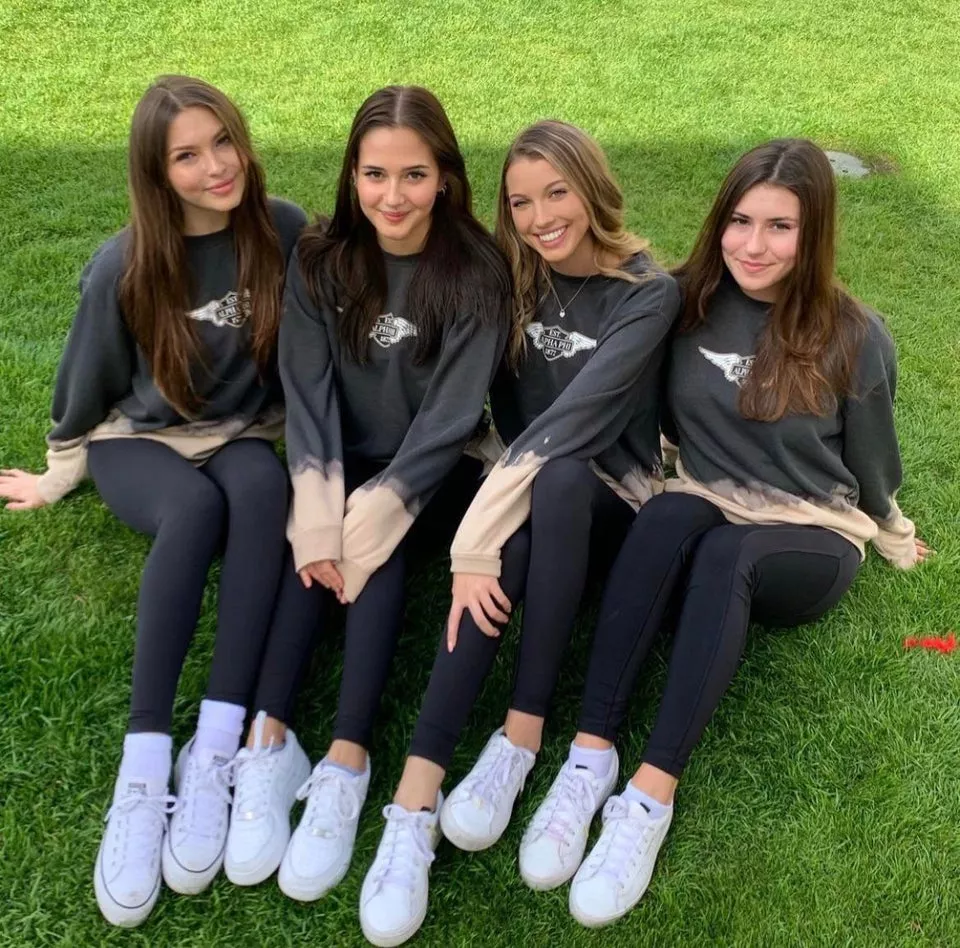 Three brunettes and one blonde