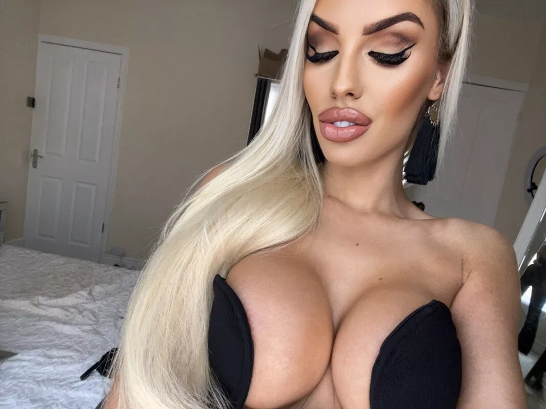 Flaunting my huge bimbo tits