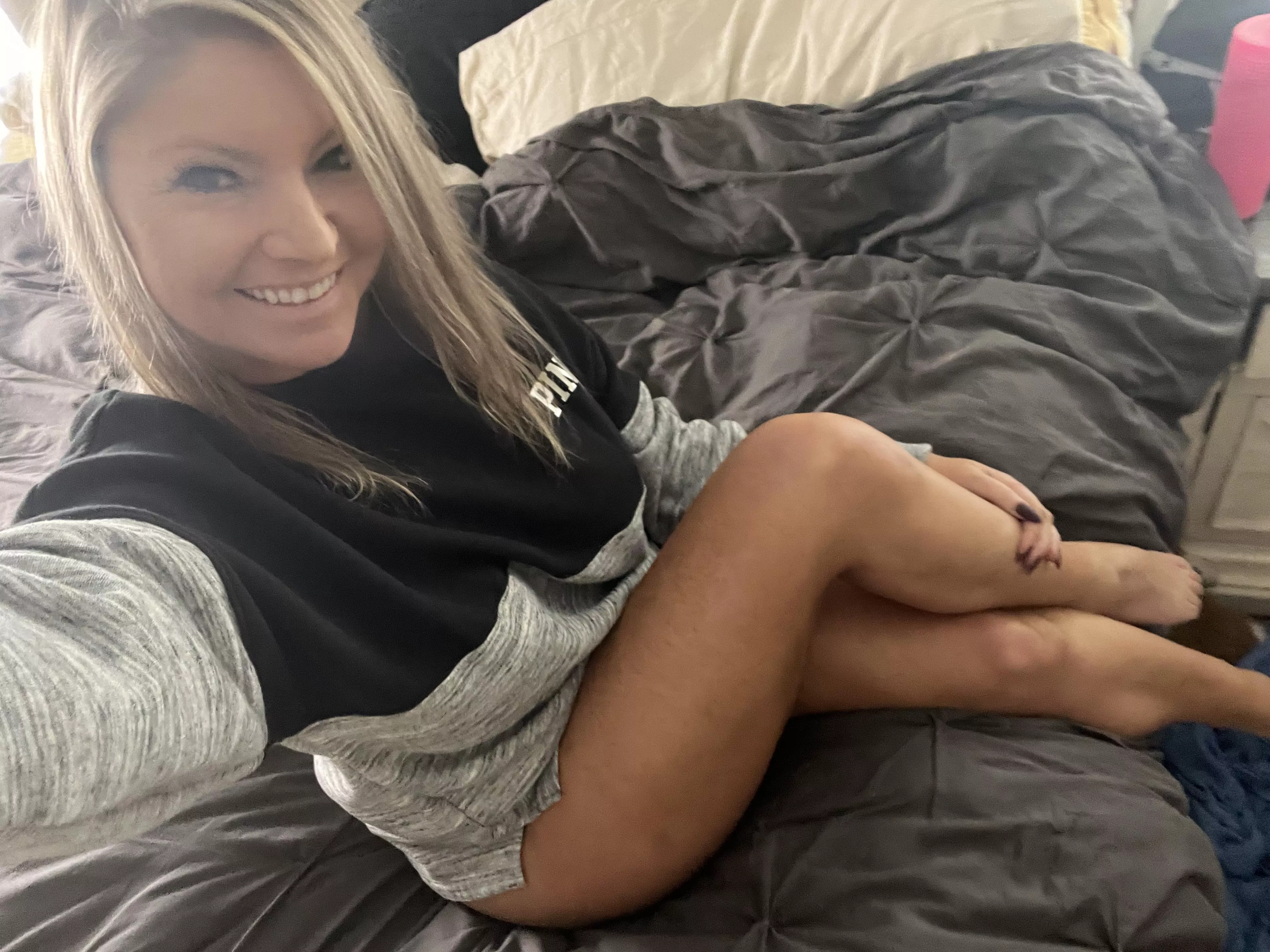 This milf is Feeling sexy in my sweater, panties or no panties ?