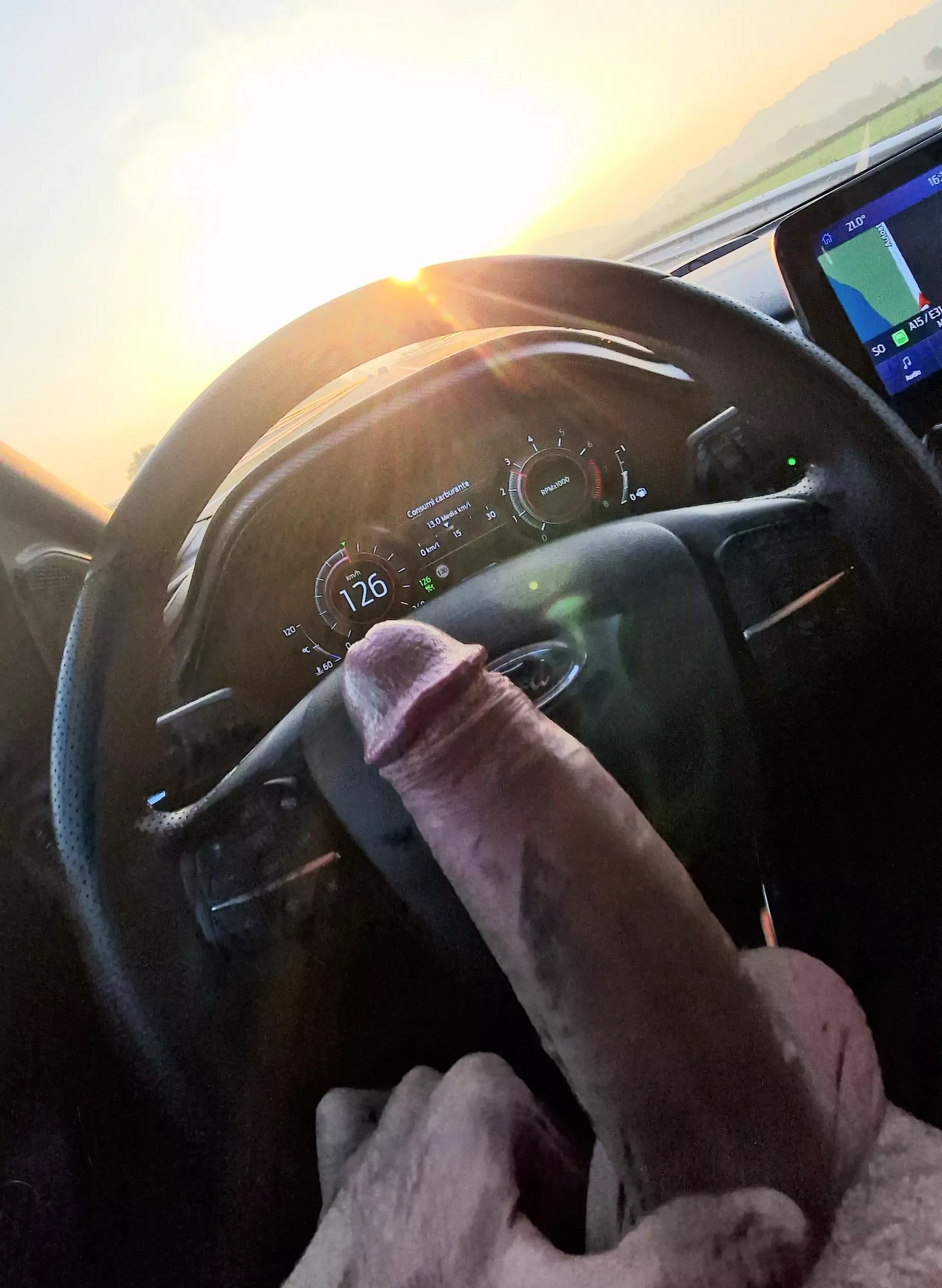 Big dick driving at sunset