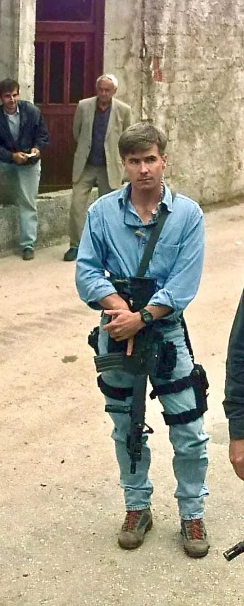 What boots is he wearing ?