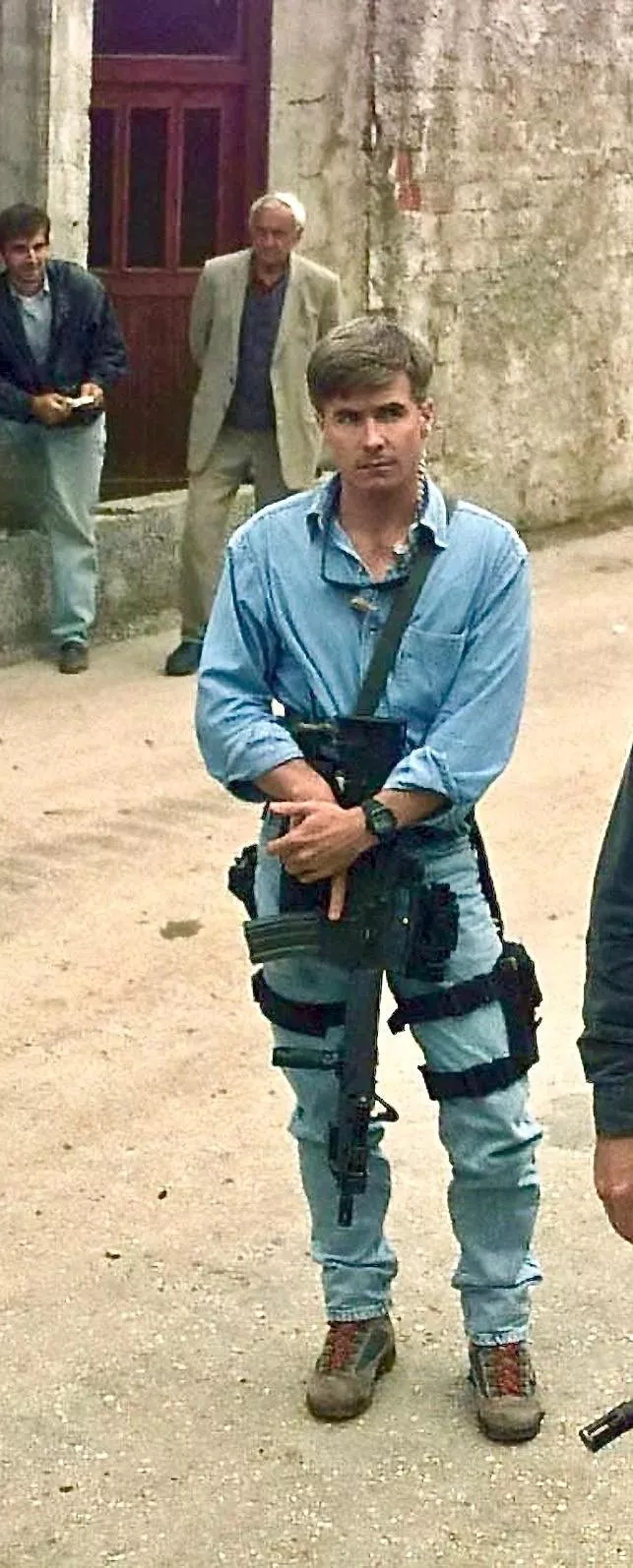 What boots is he wearing ?