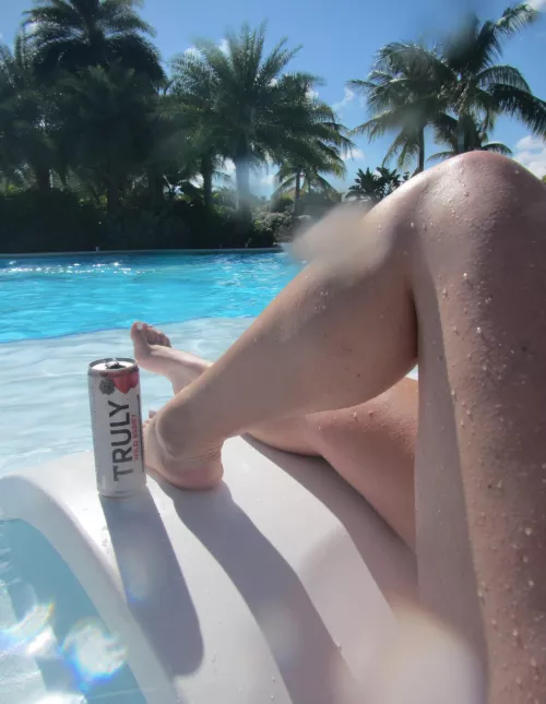 This teacher enjoys her drinks in the pool
