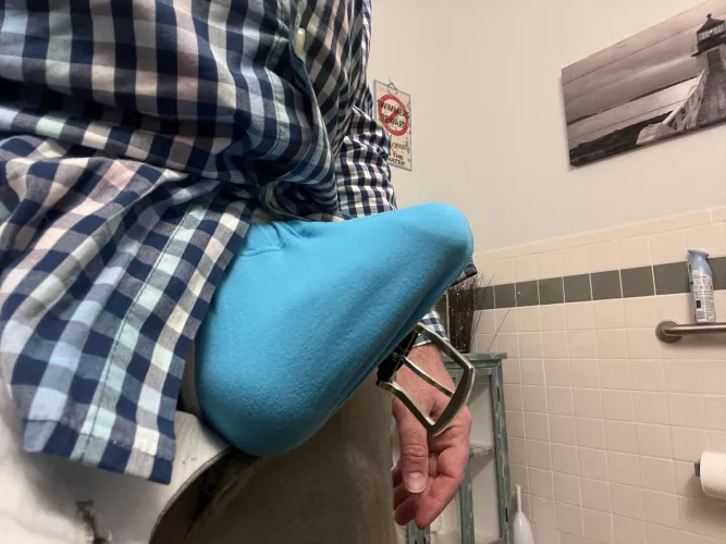 Bulging in my g-string, My dress slacks don’t do much to contain it.