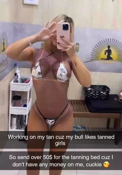 Wife is working on her tan for her bull but needs money