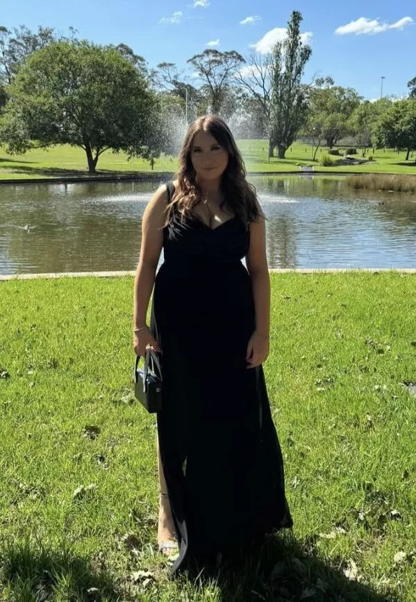 YGWBT in a black dress